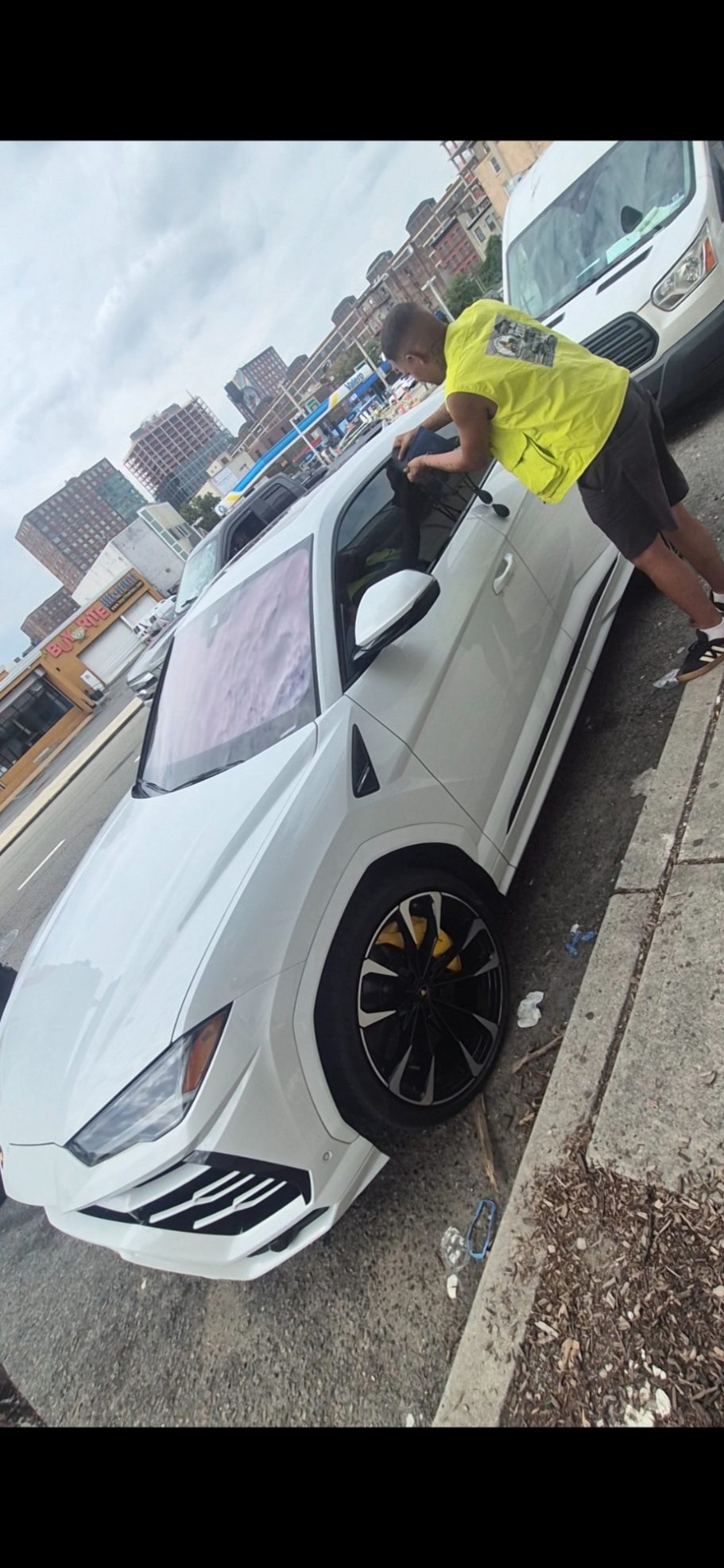 Spare Tire Installation in Hudson County, NJ | Happy Road Services happy road services tech performing a car unlocking