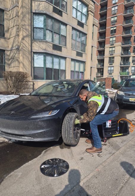 Happy road services performing a Tire Change / Tire Repair  In Hoboken NJ  , Also Serving Entire Hudson county 
