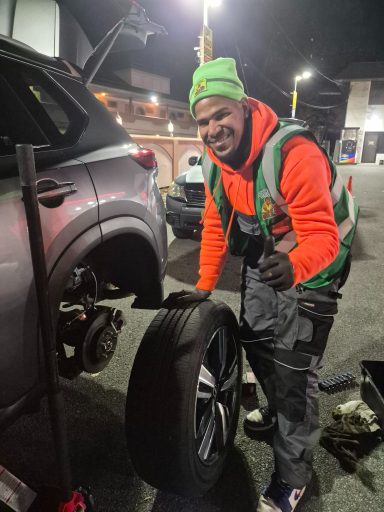 Happy road services roadside assistance in HOBOKEN NJ Doing a Tire change | tire repair 